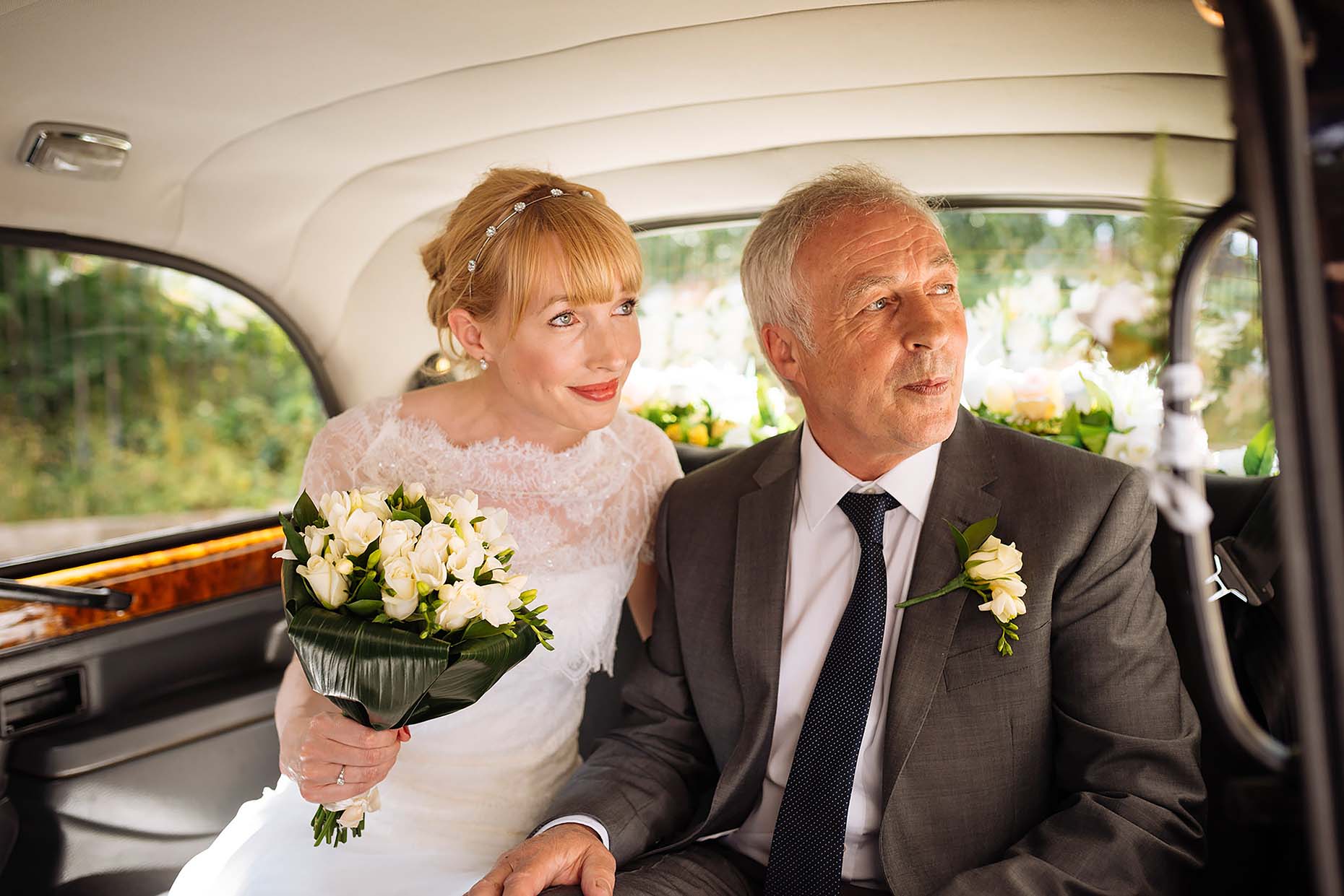 bride-father-car-arriving-church-stoke-newington-town-hall-wedding-photographer-02