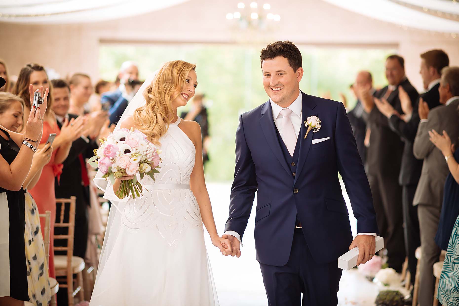 bride-groom-down-aisle-wedding-ceremony-dorset-wedding-photo-vanessa-32