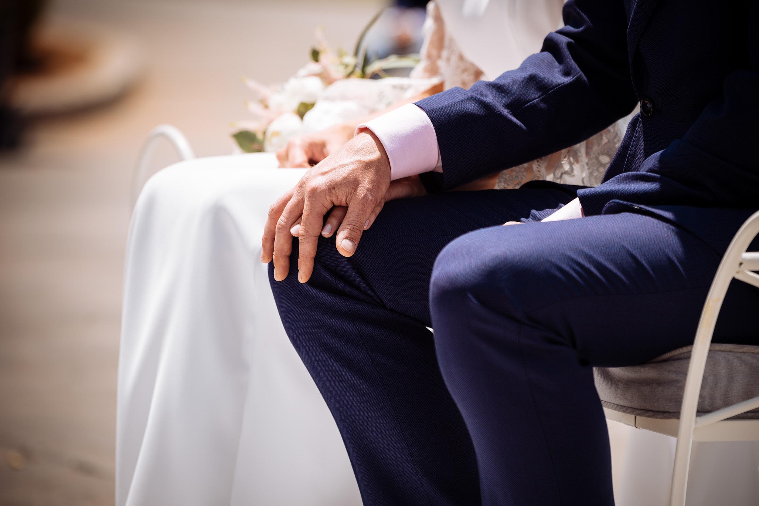 couple-holding-hands-wedding-ceremony-love-together
