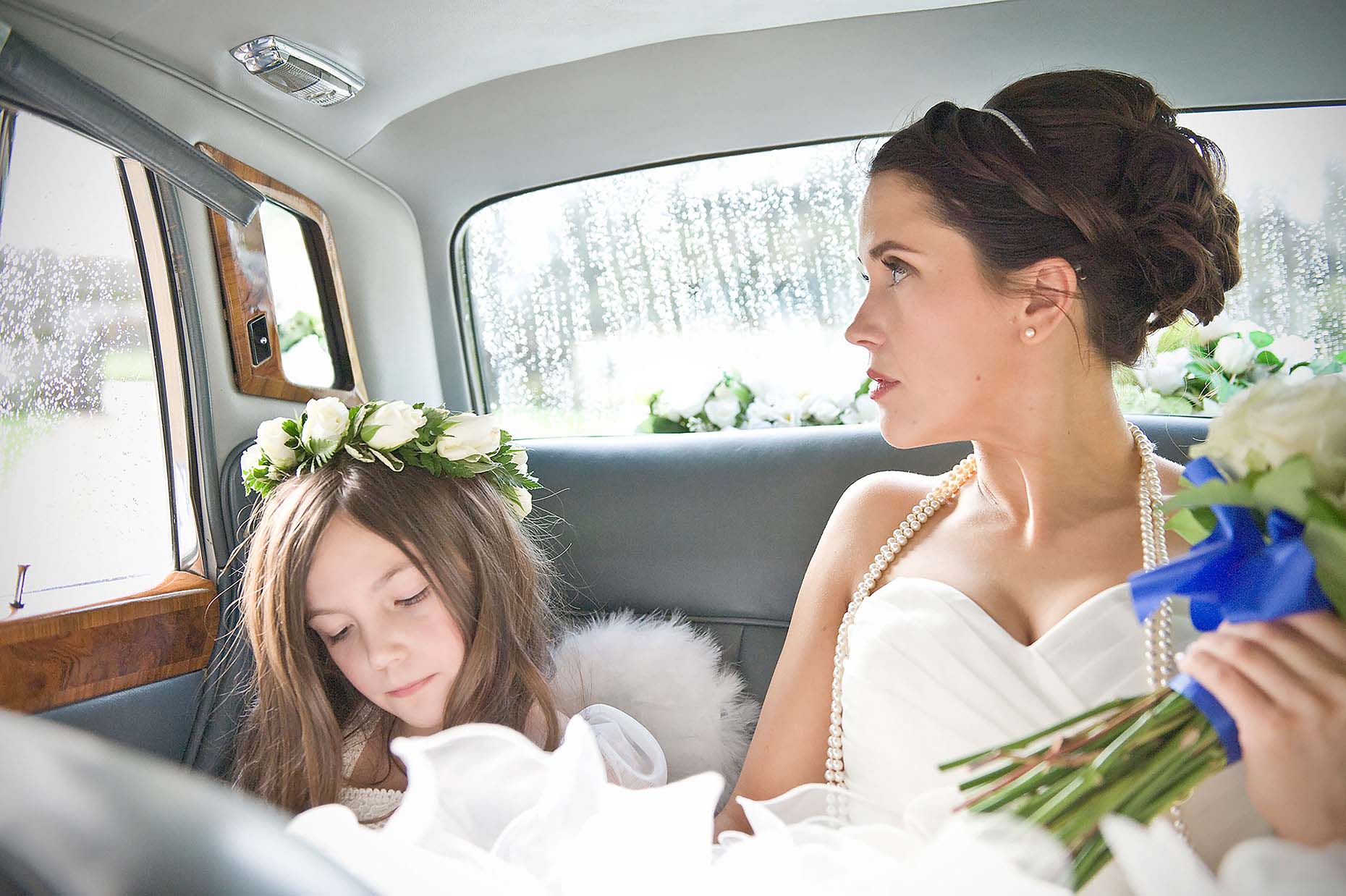 sarah-in-car-pensive-bride-before-wedding-ceremony-athelhampton-33